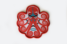 Load image into Gallery viewer, A small patch with a red formline octopus over a white background, it has teal and black accents, and red binding around the edges.