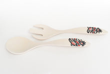 Load image into Gallery viewer, Bamboo fiberware serving fork and spoon with red and black raven design on the handles