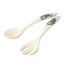 Load image into Gallery viewer, A set of 2 pieces of Serveware, one is a spoon and the other is a fork. they both have formline designs of whales on the handle. the serveware is off white, the design is black with blue accents.