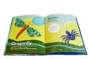 Picture of the children's book being spread open and featuring the pages for the dragonfly and spider with facts about the creatures besides them