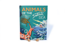 Load image into Gallery viewer, Front cover the the Animals of the Salish Sea childrens book. Cover features a turtle, octopus, and thunderbird in a contemporary native design