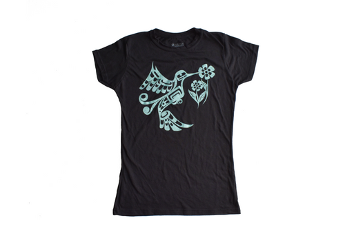 A black t-shirt with a light blue formline design printed on it, the design is of Hummingbird and two flowers. 